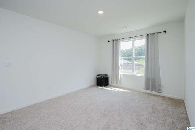 view of carpeted spare room