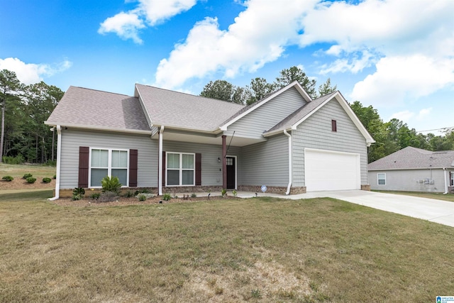 single story home with a garage and a front lawn