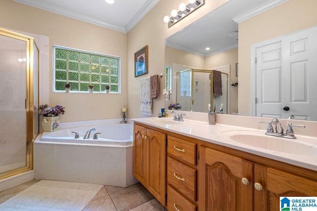 bathroom with double vanity, a shower stall, a bath, and a sink