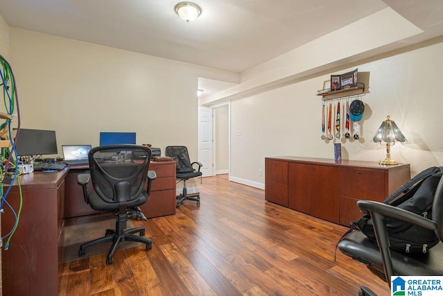 office space with dark hardwood / wood-style floors