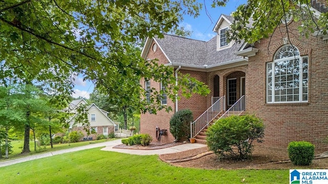 view of property exterior featuring a lawn