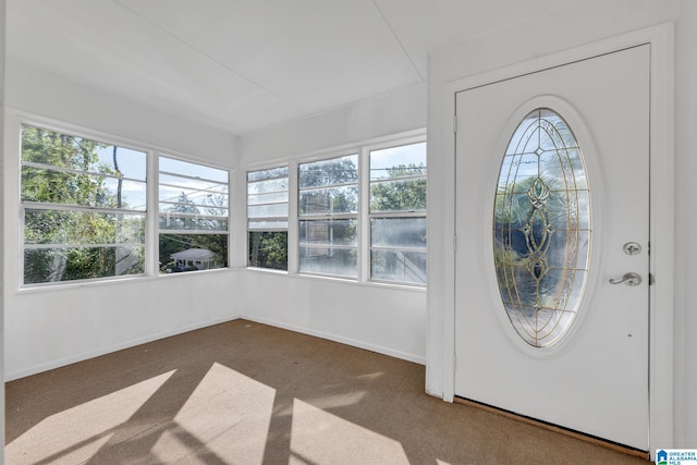 view of carpeted entrance foyer