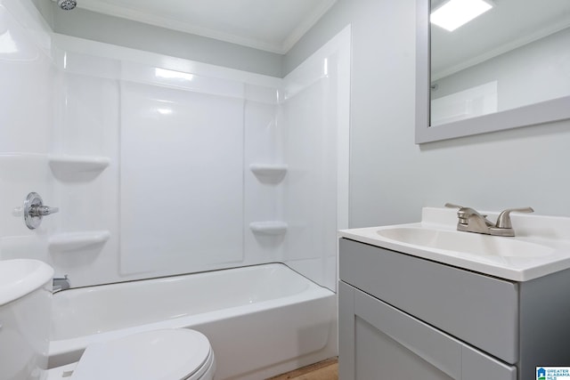 full bathroom with toilet, ornamental molding, bathing tub / shower combination, and vanity