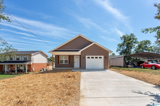 view of front of property with a garage, a carport, and a porch