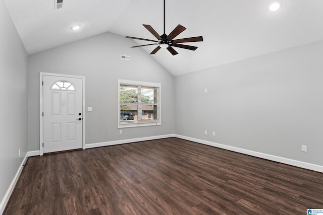 entryway with ceiling fan, hardwood / wood-style floors, and high vaulted ceiling