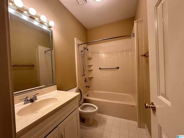 full bathroom featuring vanity, toilet, tile patterned flooring, and tiled shower / bath