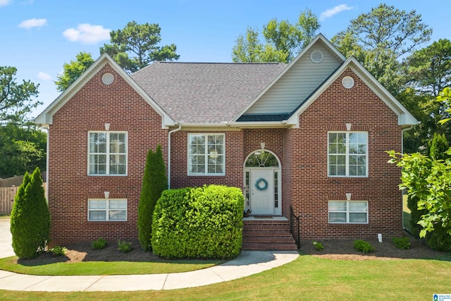 view of front of home with a front yard