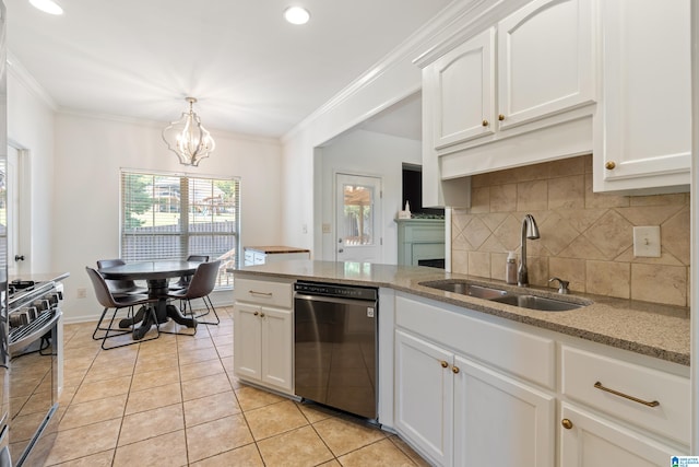 kitchen with an inviting chandelier, light stone counters, stainless steel appliances, white cabinetry, and sink