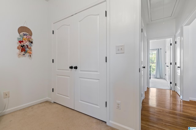 hallway with light wood-type flooring