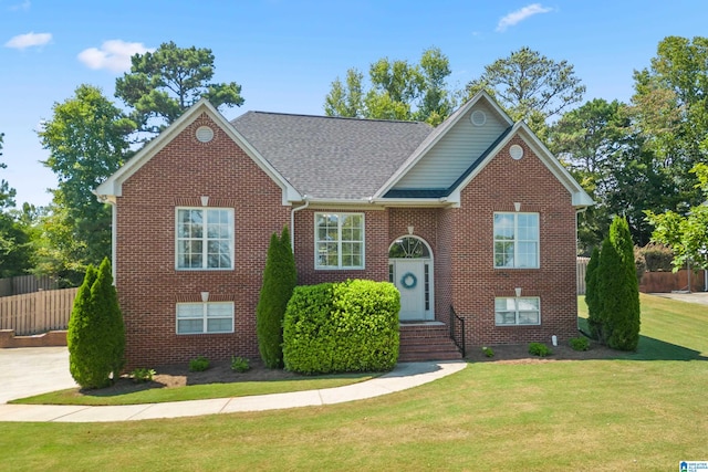 view of front of home with a front lawn