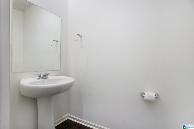 bathroom featuring wood-type flooring