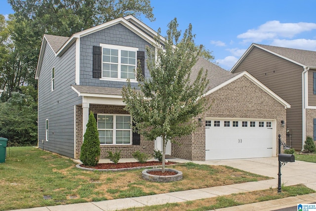 view of front facade featuring a garage and a front yard