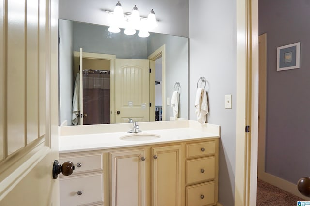 bathroom featuring vanity and walk in shower