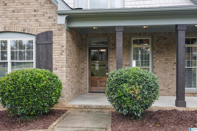 property entrance featuring covered porch