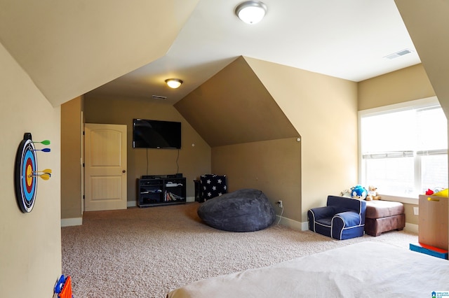 bonus room featuring carpet floors and vaulted ceiling