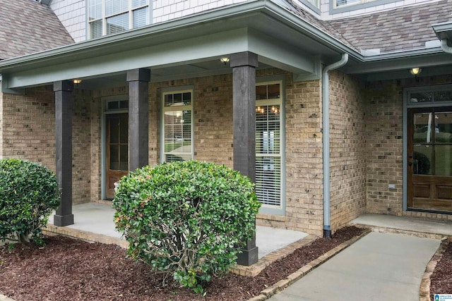 property entrance featuring a porch