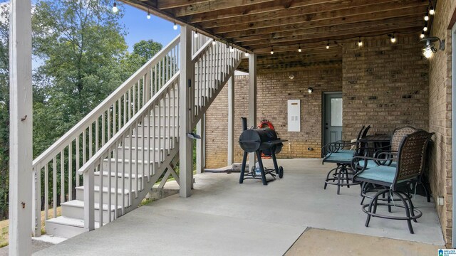 view of patio with a grill