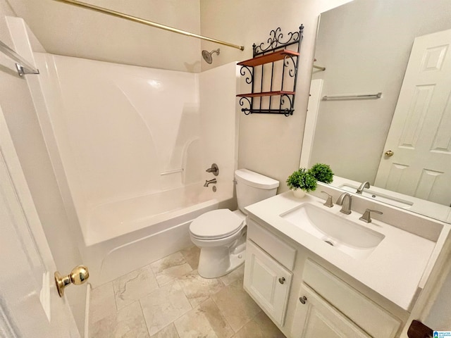 full bathroom featuring washtub / shower combination, toilet, and vanity