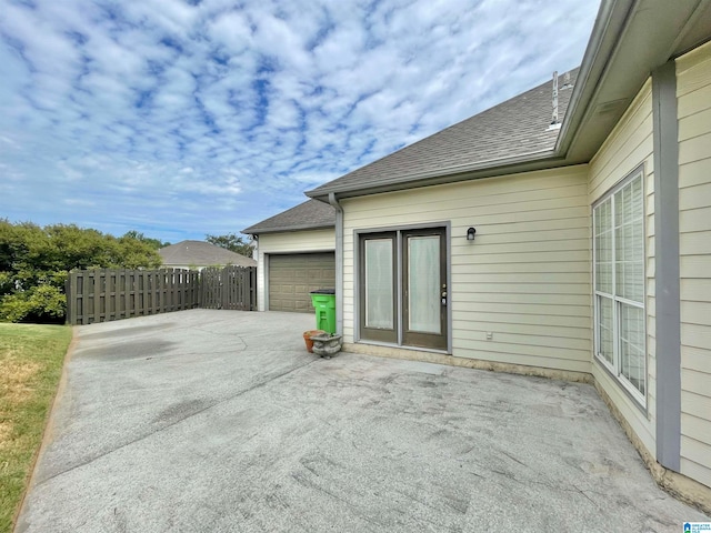 view of patio with a garage