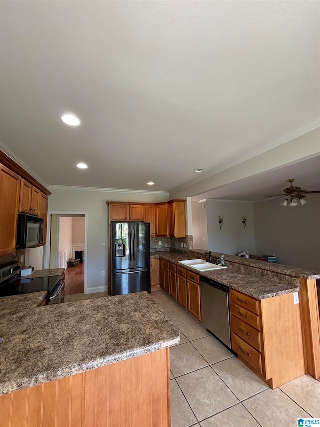 kitchen with black appliances, ceiling fan, light tile patterned floors, and kitchen peninsula