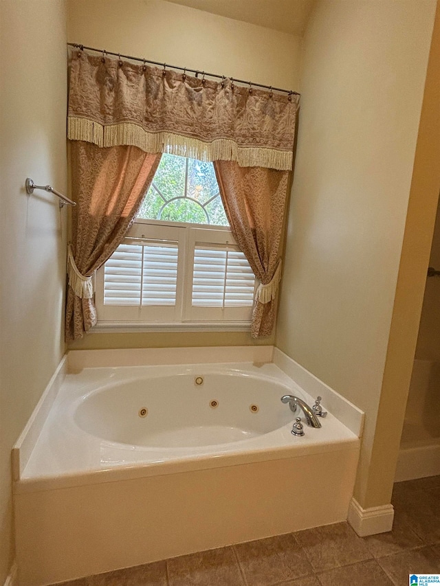 bathroom with tile patterned flooring and independent shower and bath