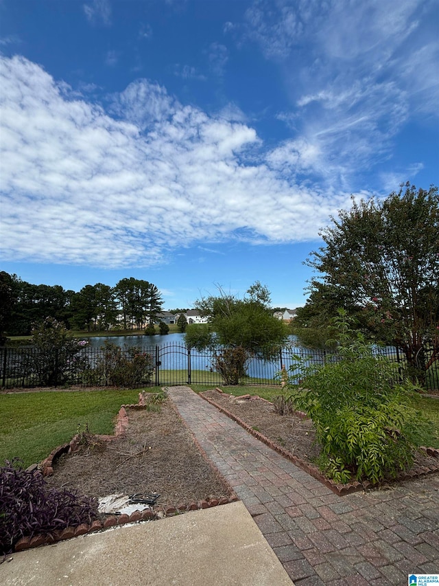 exterior space with a water view