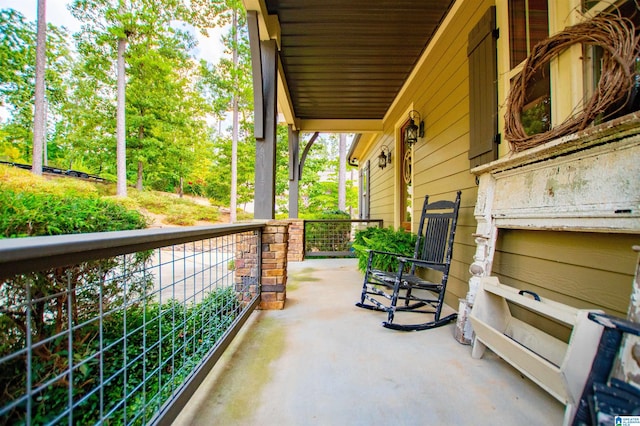 view of patio with a balcony