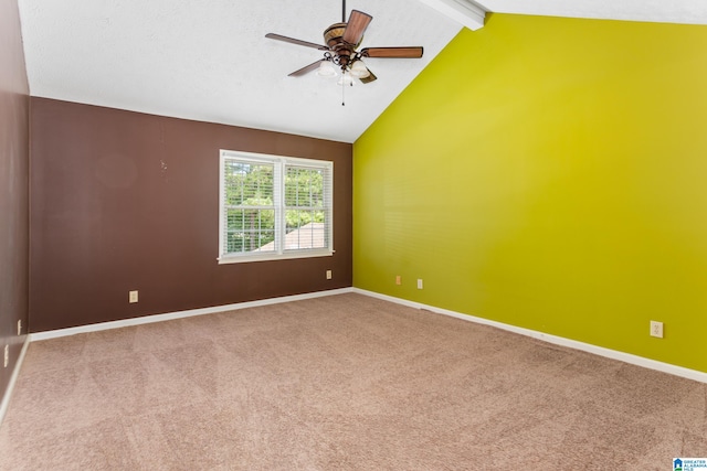 carpeted empty room with lofted ceiling with beams and ceiling fan