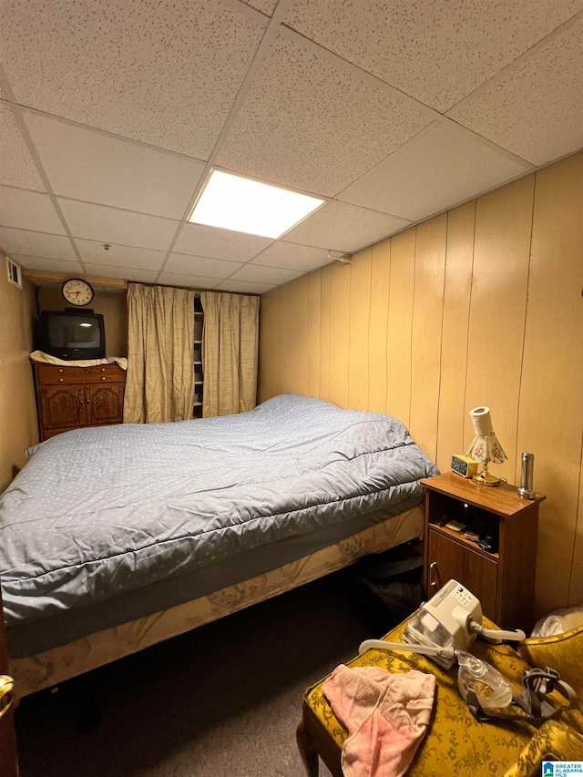 bedroom with a drop ceiling