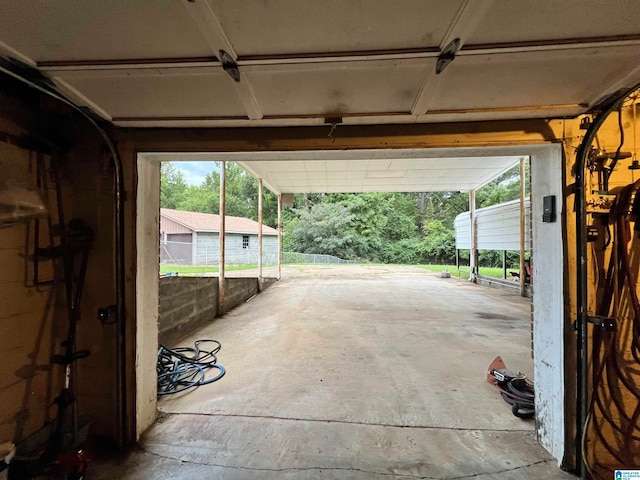 garage featuring a carport