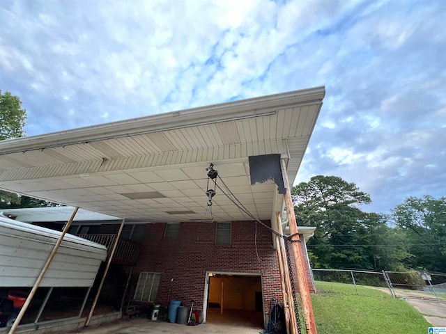 view of side of property with a yard