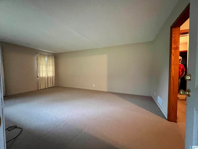 unfurnished room with carpet floors