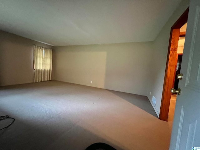 unfurnished room featuring carpet flooring