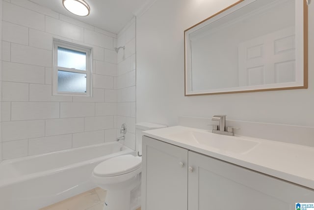 full bathroom featuring toilet, tiled shower / bath combo, and vanity