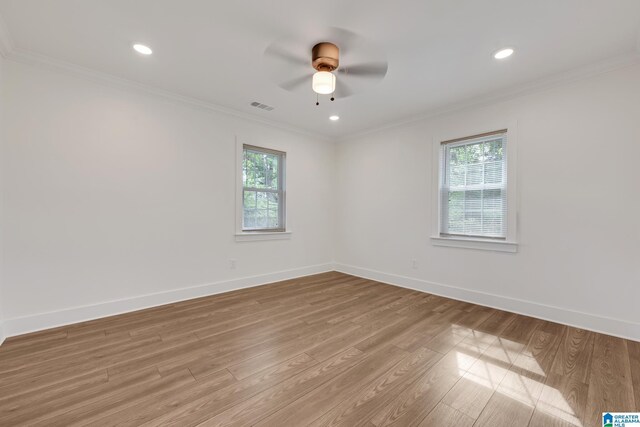 unfurnished bedroom with hardwood / wood-style floors, ceiling fan, and ornamental molding