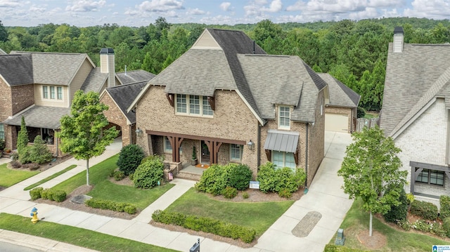 view of front of property featuring a porch and a garage