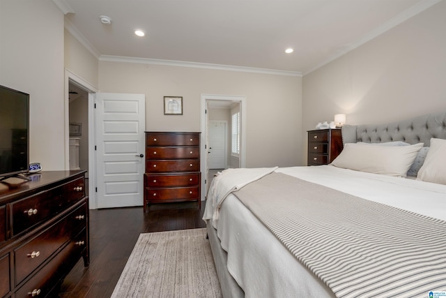 bedroom featuring dark wood-type flooring and ornamental molding