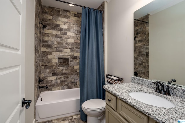 full bathroom featuring vanity, toilet, and shower / bath combo with shower curtain