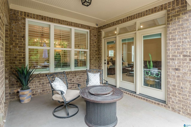 view of patio featuring a fire pit