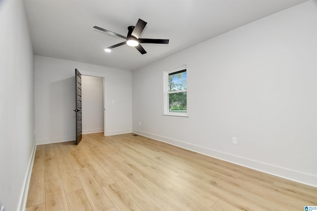 207 Friendship Cir, Clanton, AL 35045 - unfurnished room with baseboards, ceiling fan, and light wood-style floors