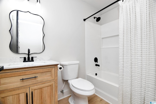 full bathroom with vanity, toilet, shower / tub combo, and hardwood / wood-style floors