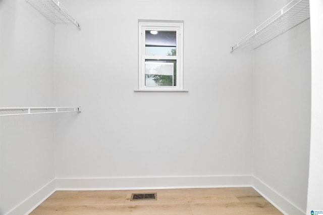 207 Friendship Cir, Clanton, AL 35045 - walk in closet featuring light wood-style flooring and visible vents
