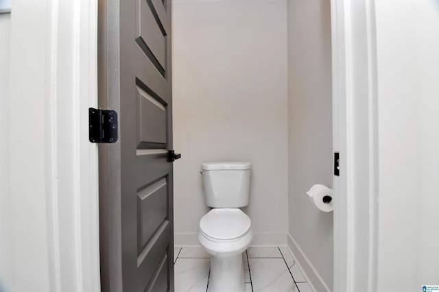 207 Friendship Cir, Clanton, AL 35045 - bathroom featuring marble finish floor, baseboards, and toilet