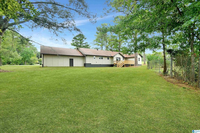 207 Friendship Cir, Clanton, AL 35045 - view of yard featuring fence and a wooden deck