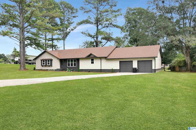 single story home featuring a garage and a front yard