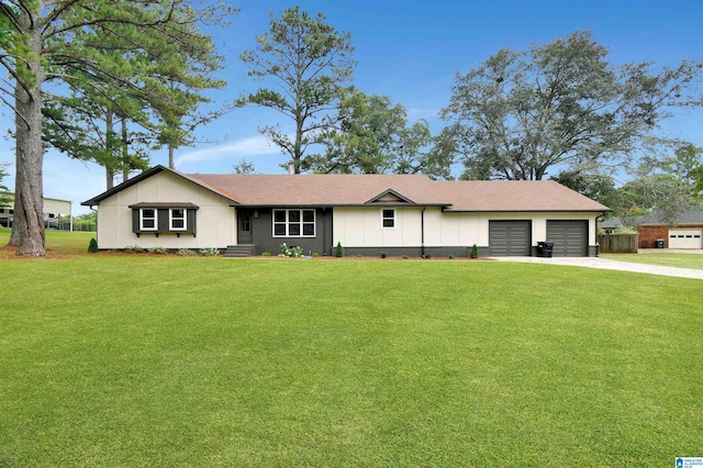 ranch-style house with a garage and a front lawn