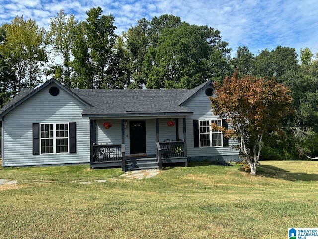 ranch-style house with covered porch and a front yard