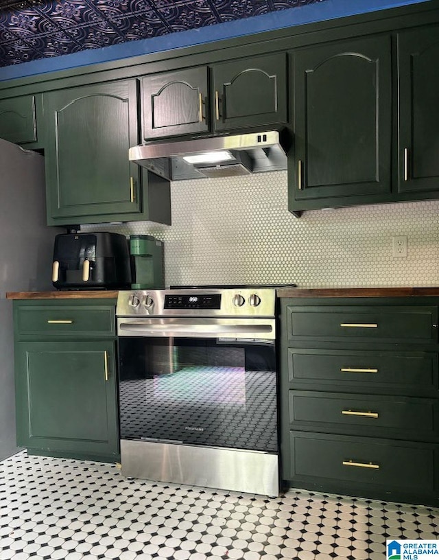 kitchen featuring stainless steel electric range oven and green cabinetry