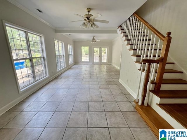 interior space featuring ceiling fan, ornamental molding, and light tile patterned floors