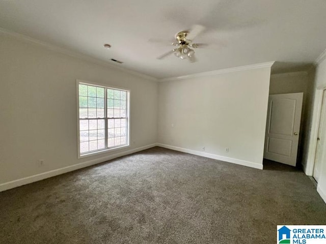 carpeted spare room featuring ceiling fan and crown molding